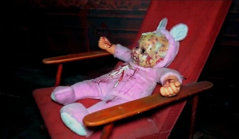 Dead doll in a chair