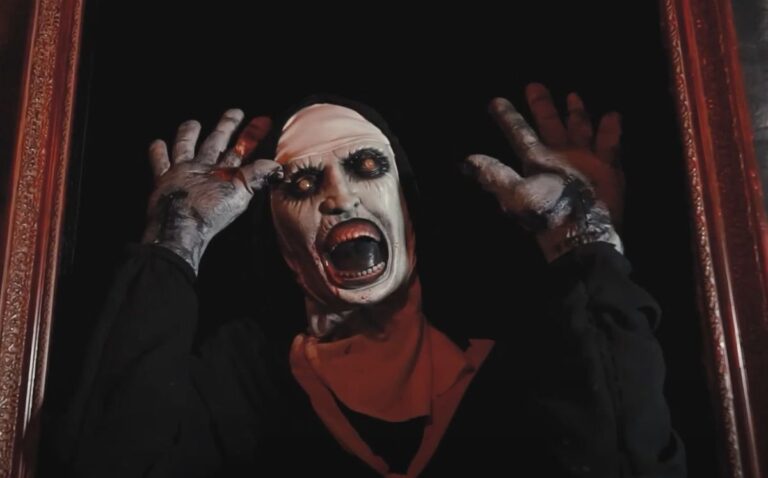 The nun behind the painting